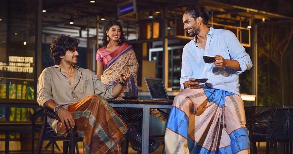 Bangladeshi men wearing national dress including shirt, kurta and lungi representing Bangladeshi culture